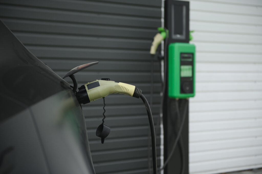 plug in charging power to electric vehicle