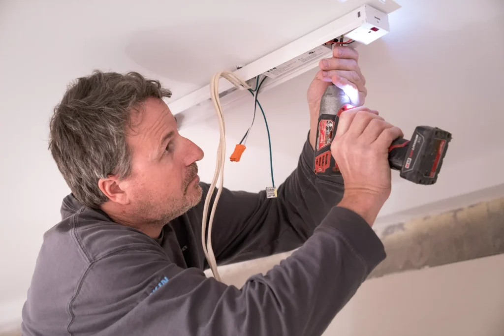 a electrician performing electrical services in louis park, mn.