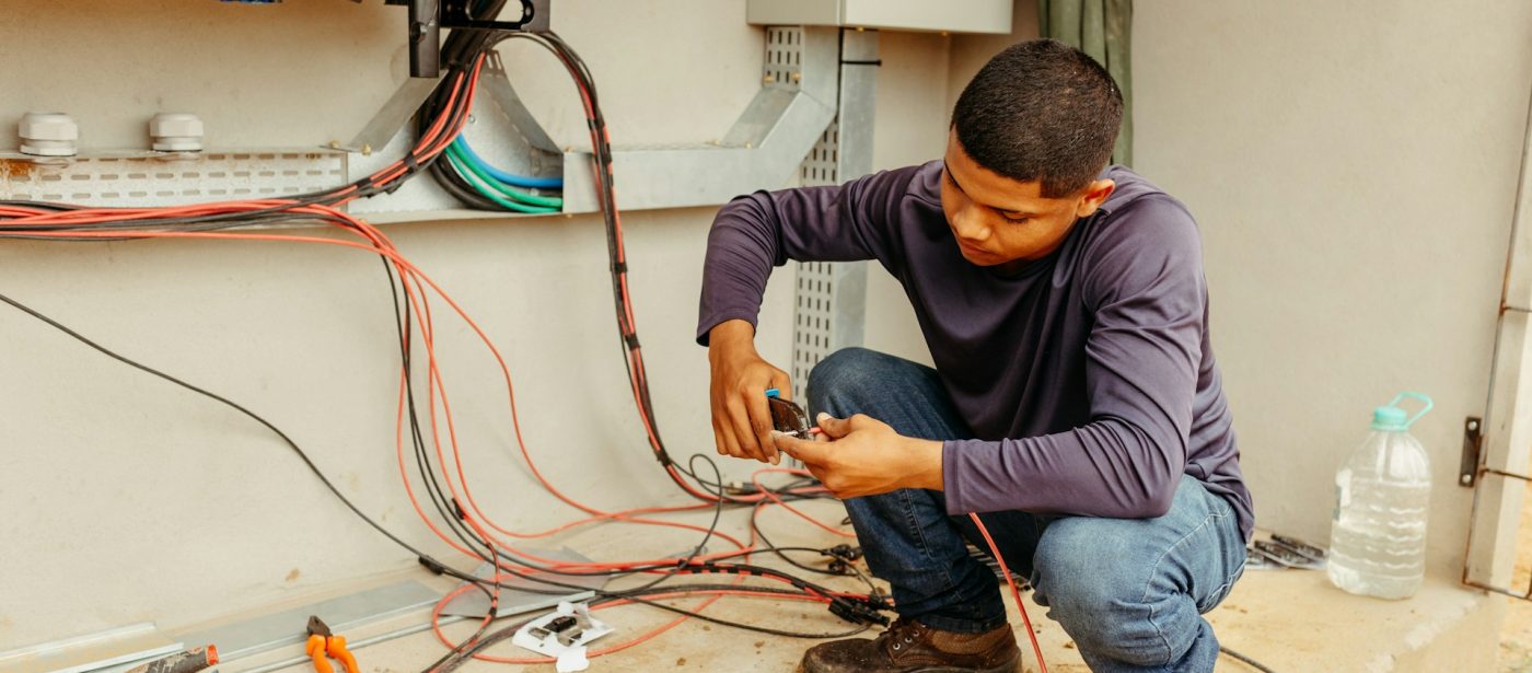 An electrician repairing a electrical system