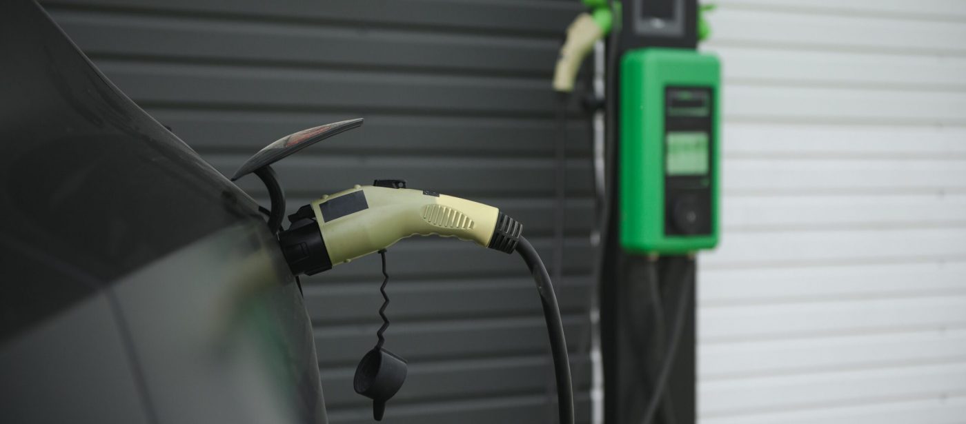 plug in charging power to electric vehicle